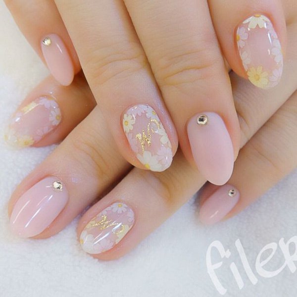 Awesome floral nail arts with pink white and yellow color